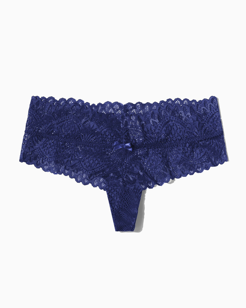 Low-waist lace thong in navy blue with scalloped lace trim and bow accent