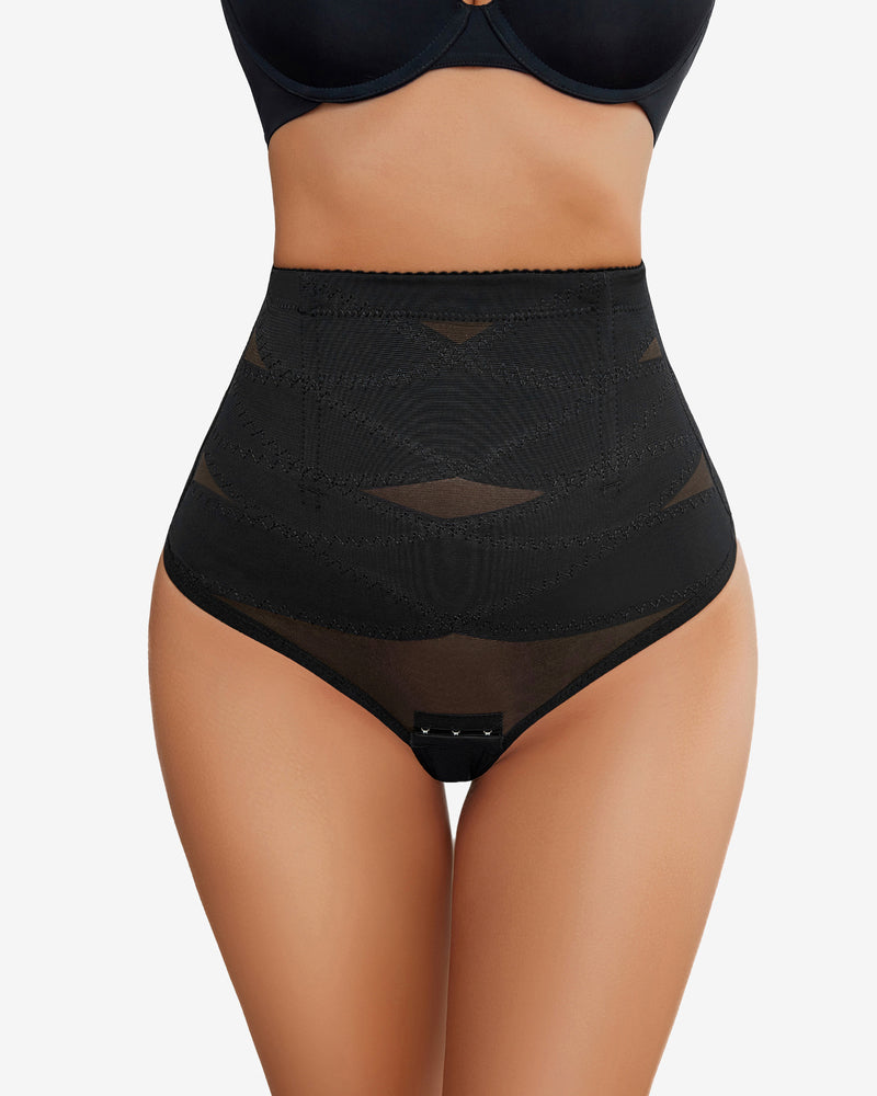 Black tummy control thong shapewear with sheer mesh front panel and covered leg openings