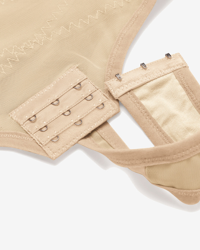 Champagne thong shapewear close-up of back hook-and-eye closure and smoothing panel