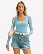 Light blue square-neck long-sleeve one-piece bodysuit with high-cut leg, front view
