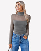 Turtle-neck mesh bodysuit with long sleeves and ruched front, dark gray
