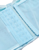Light blue corset top close-up of hook-and-eye closure and boning detail