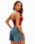 Red push-up corset bustier shown from side with thin straps and sweetheart cups