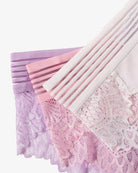 Lace hipster panties close-up in lavender, white, and pink with striped waistband.