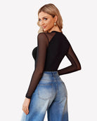 Black turtleneck mesh one-piece leotard with sheer long sleeves