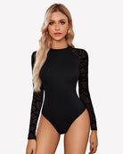 Black turtleneck mesh one-piece leotard with sheer patterned sleeves