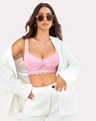 Pink lace underwire bralette with scalloped lace trim and underwire cups
