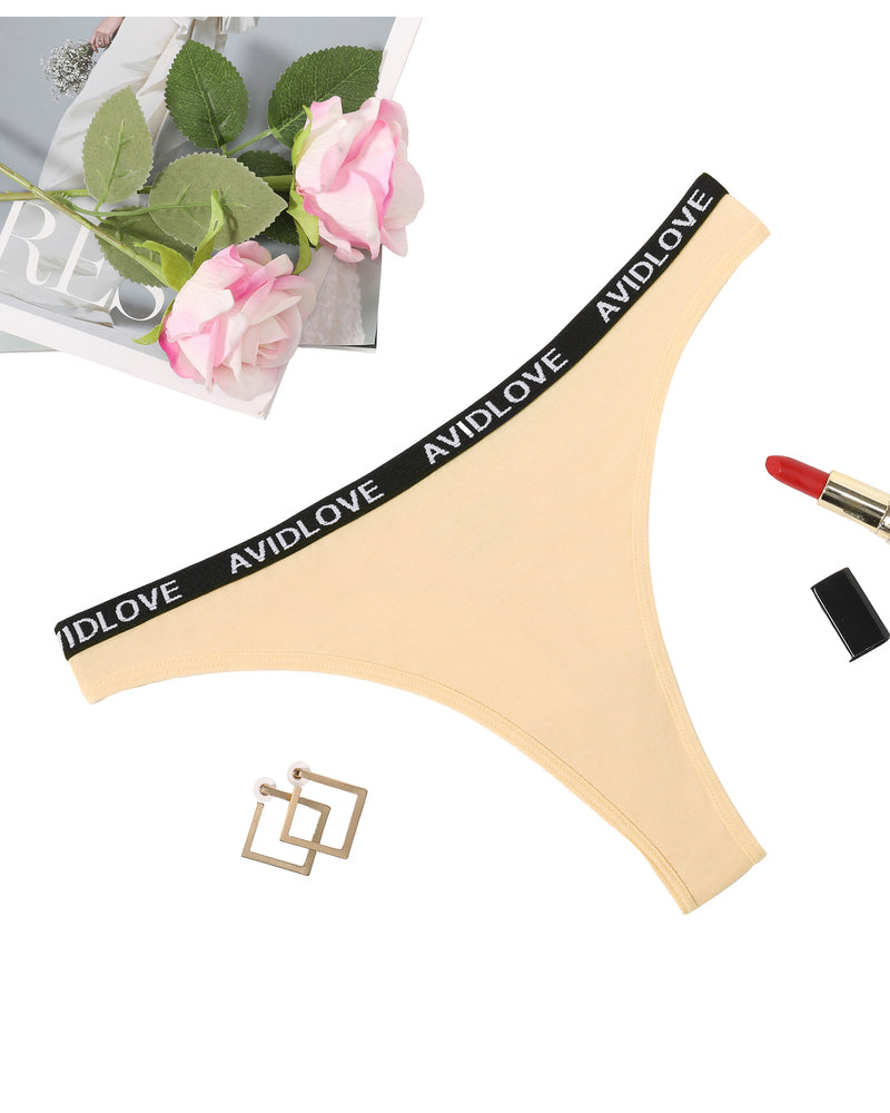 Low-rise thong panties, pale yellow-beige, black AVIDLOVE logo waistband.