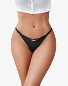 Black lace g-string T-back thong with small rose-accented center on model