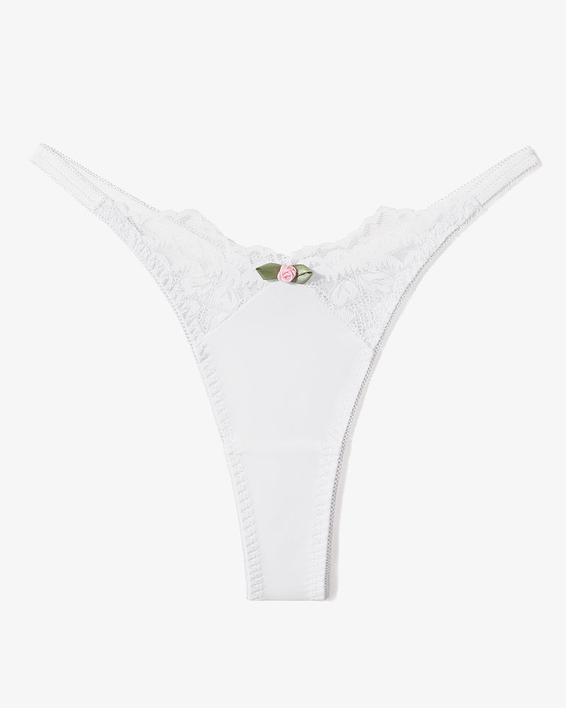 White lace G-string thong with T-back and scalloped lace detailing, small bow centerpiece.