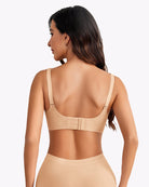 Beige seamless nursing bra with adjustable straps, back view.