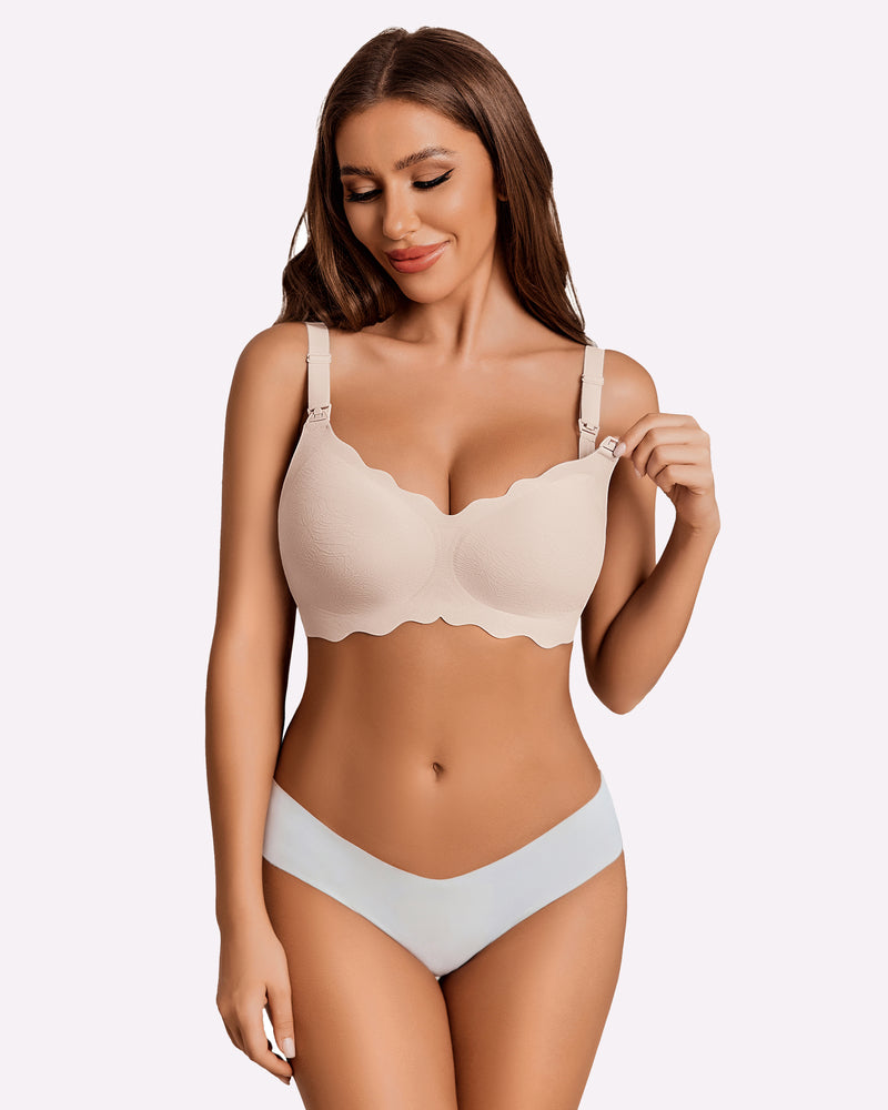 Seamless nursing bra light brown worn by model, molded cups and adjustable straps