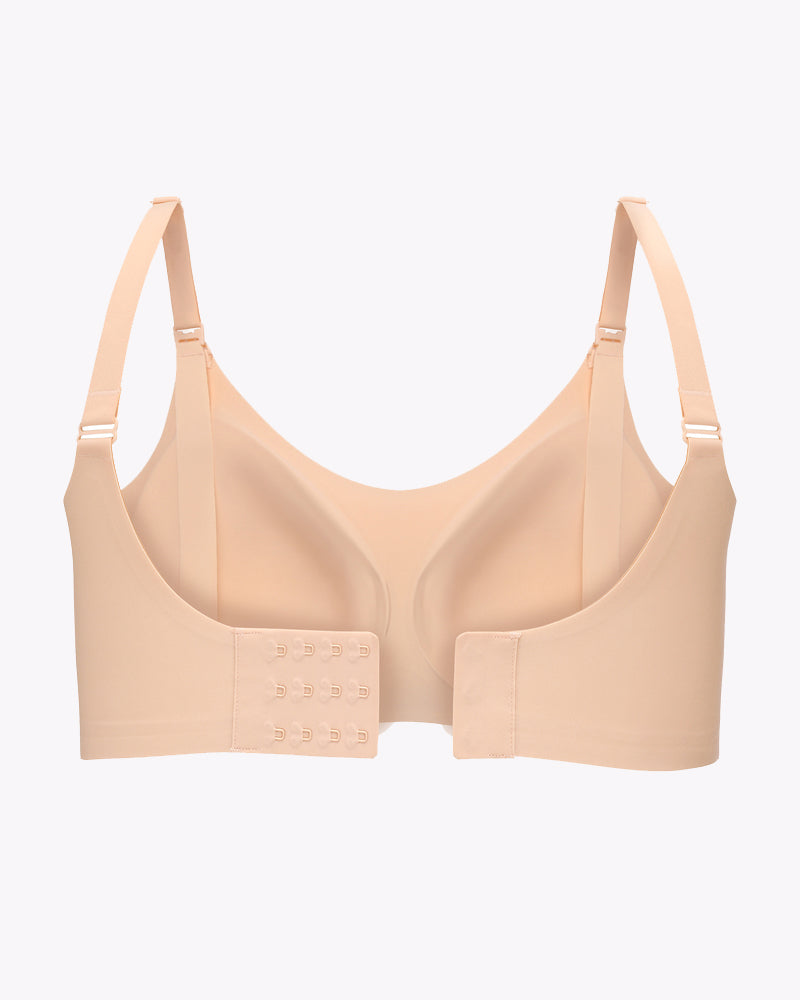 Seamless wireless maternity bra, light beige/nude, front view with clasped straps
