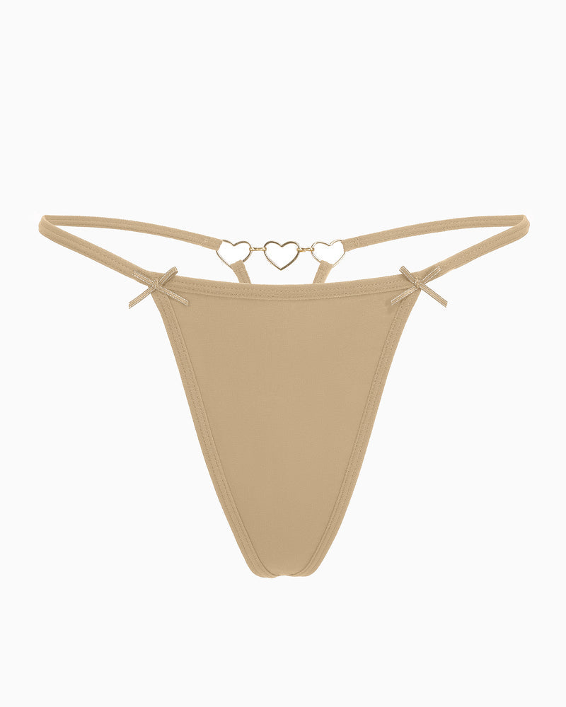 Beige/tan g-string thong with gold heart ring detail and bow side ties