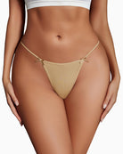 Beige/tan g-string thong with small bow details at the sides, worn on model