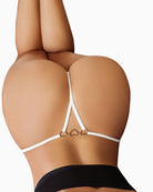White G-string thong with small heart-ring at strap center