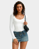 Scoop neck bodysuit shapewear in white, long sleeves, close fit at bust.