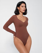 Brown double-lined tummy control bodysuit with long sleeves and V-neck.