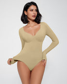 Khaki double-lined tummy control bodysuit with long sleeves, V-neck and fitted legs.