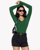 Green long-sleeve double-lined bodysuit with deep V neckline, fitted design