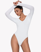 White long-sleeve double-lined bodysuit, front view with long sleeves and high-cut leg