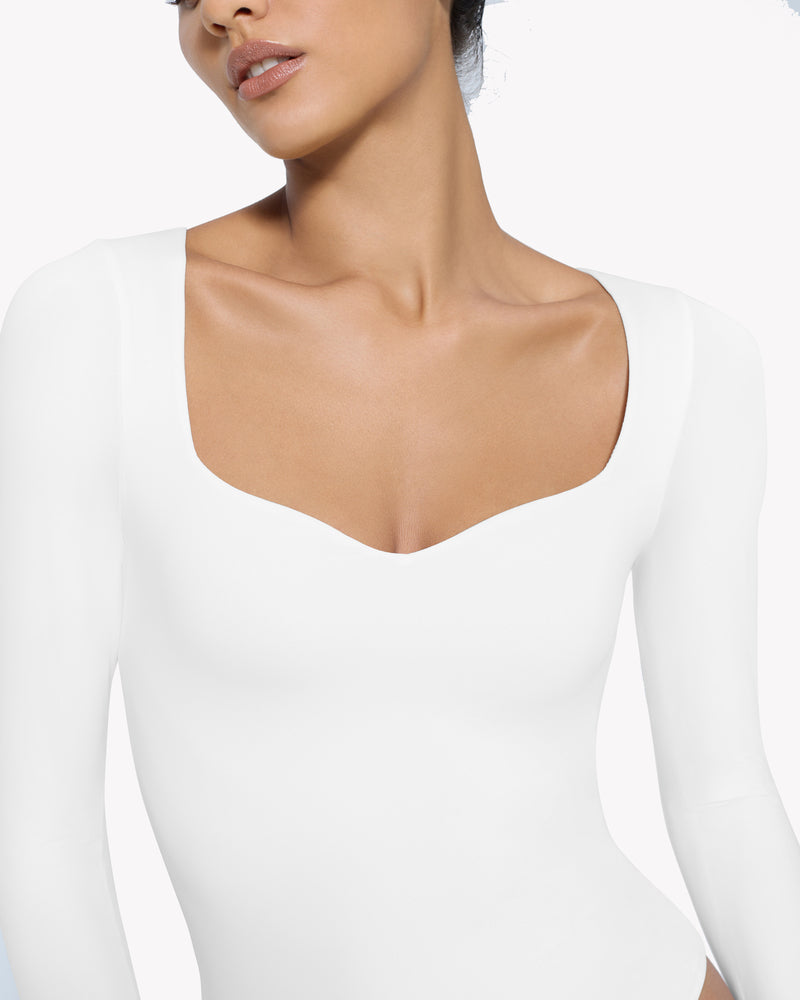 White sweetheart-neck bodysuit, long sleeves, double-lined shapewear