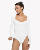 White sweetheart-neck bodysuit, long sleeves, high-cut legs
