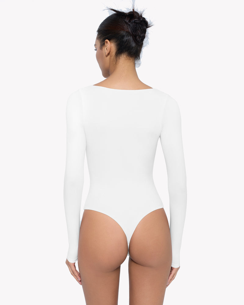 White sweetheart-neck bodysuit, long sleeves, back view with high-cut legs