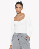 White sweetheart-neck bodysuit, long sleeves, front view