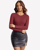 Burgundy long sleeve thong bodysuit with slim fit and double-lined finish