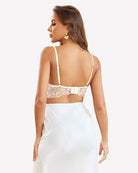 Cream underwired corset bustier top back view with lace hem and thin straps