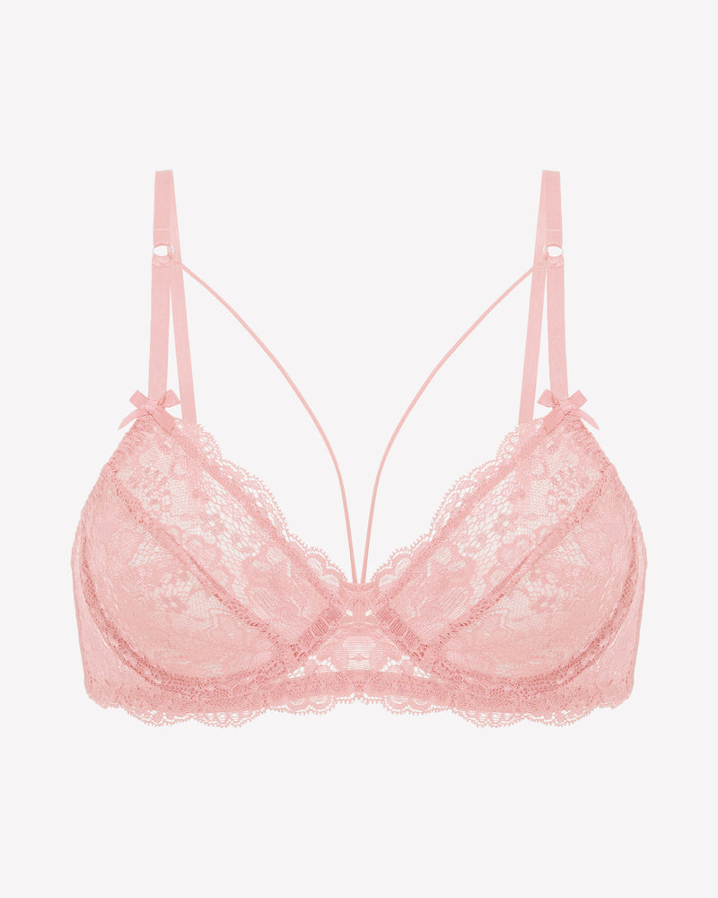 Pink lace unlined strappy bra with underwire cups and bow accents on straps