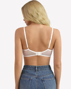 White lace unlined strappy bra with crisscross back straps and underwire cups