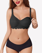 Seamless black maternity bra with molded cups and scalloped underband
