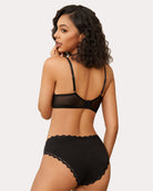 Minimizer sheer balconette bra in black lace, back view with adjustable straps