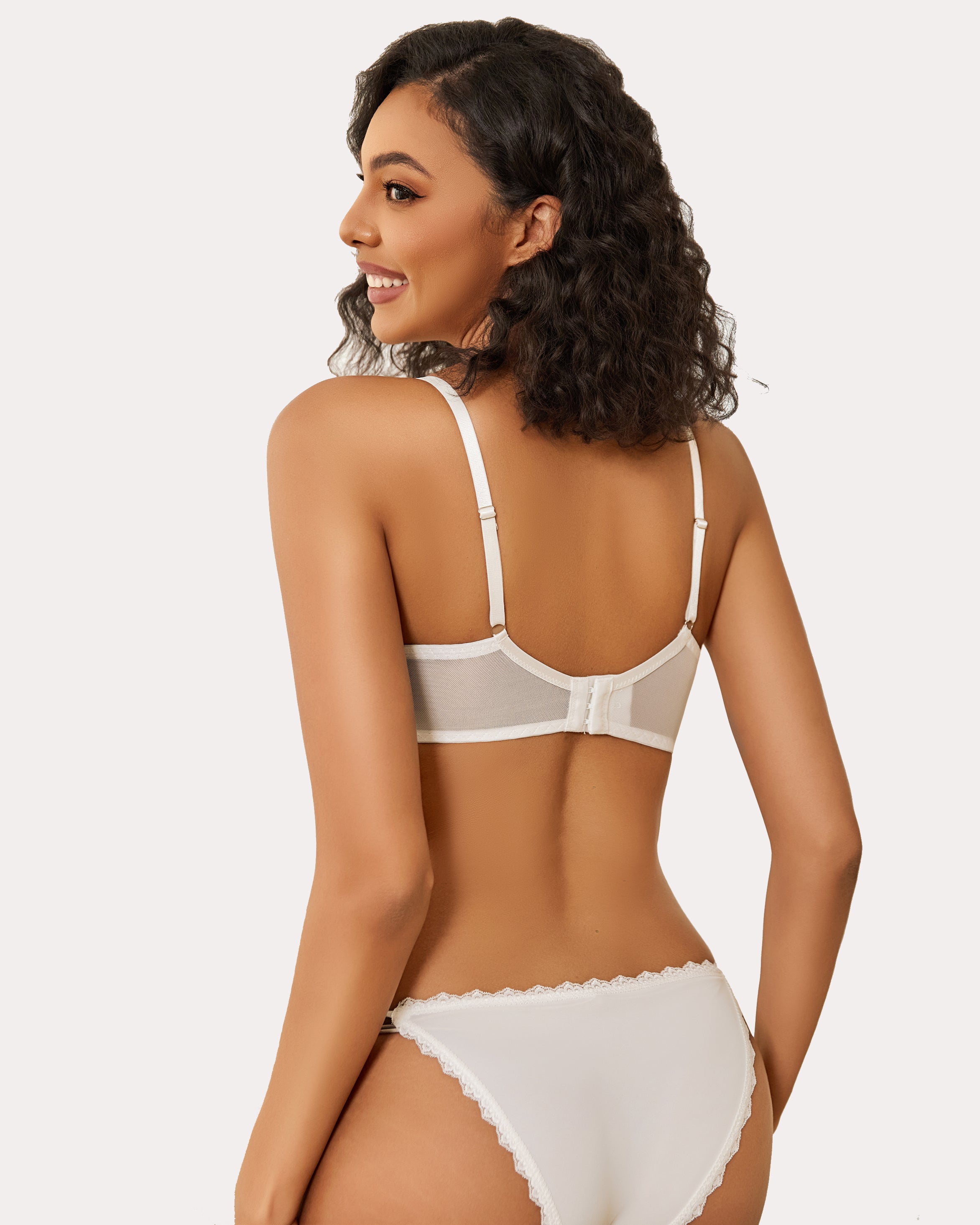 Sheer balconette minimizer bra in white, back view with racer straps and lace trim