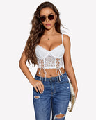 White lace underwire corset bralette with bow-front and crisscross lace-up panels