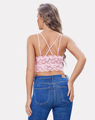 Pink lace cami crop top with crisscross back straps and scalloped lace hem