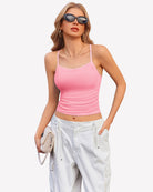 Ruched camisole top with thin spaghetti straps, pink color front view