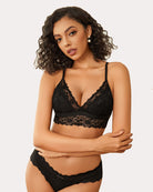 Black lace wireless non-padded bralette with spaghetti straps and floral lace cups