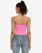 Double lined crop tank top in hot pink from back, spaghetti straps