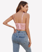 Pink lace corset bustier back view with thin straps and lace mesh panel