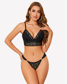 Black lace low-rise cheeky tanga underpants on model