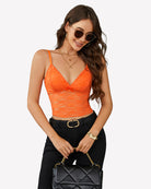 Orange lace V-neck camisole crop top with adjustable spaghetti straps and bow detail