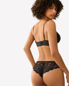 Black lace bralette and matching lace hipster panties, side/back view