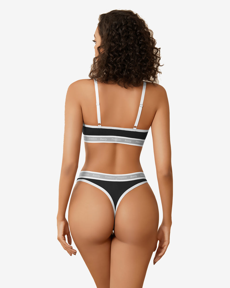 Contrast bra and panty set in black with white elastic trim and back straps