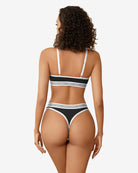 Contrast bra and panty set in black with white elastic trim and back straps