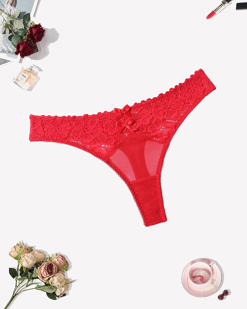 Red lace low-waist thong with cheeky cut, bow detail, and sheer mesh panel