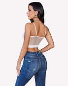 Fishnet crop bralette back view with spaghetti straps, white mesh lattice panel