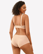 Nude seamless wireless bra with adjustable straps, rear view